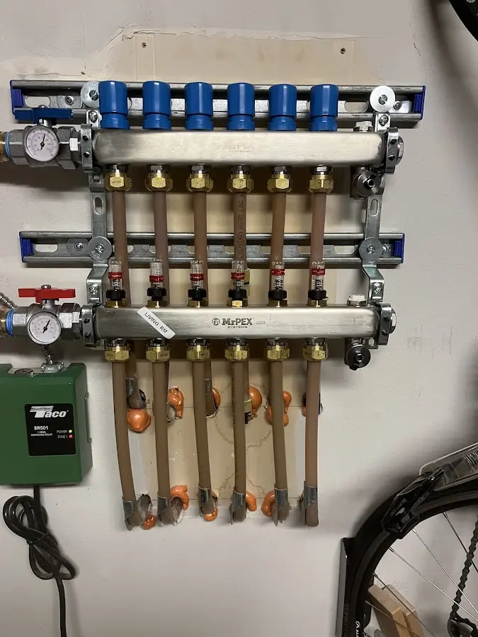 Plumber performing Water Heater Repair at a residential property in Lake Zurich